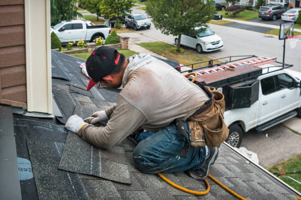 Professional Flat Roof Repair technician working in Stowe, VT